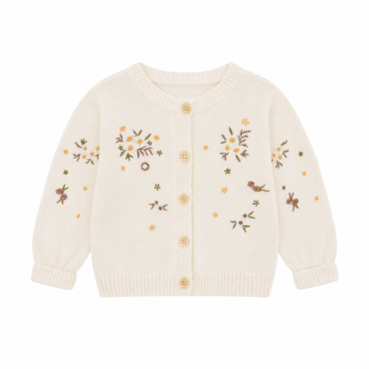 Front view of the cream girls cotton knit cardigan with botanical embroidery and button-front closure.