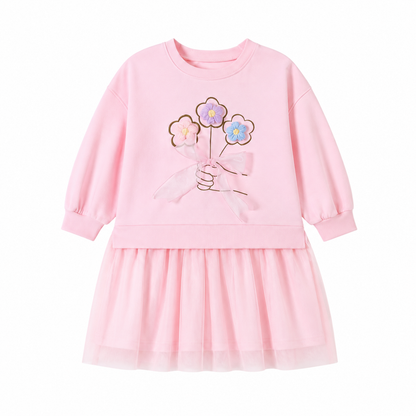 Front view of a pink girls cotton dress with flower and bow detail.