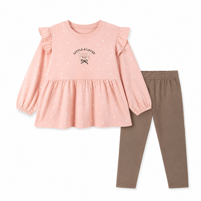 Front flat lay of a blush pink and taupe girls cotton two piece set with a polka dot ruffle top and matching pants.
