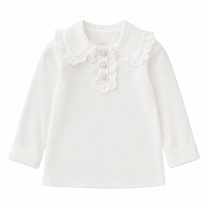 Front flat lay of a white girls cotton top with long sleeves, ruffle collar, and decorative button details.