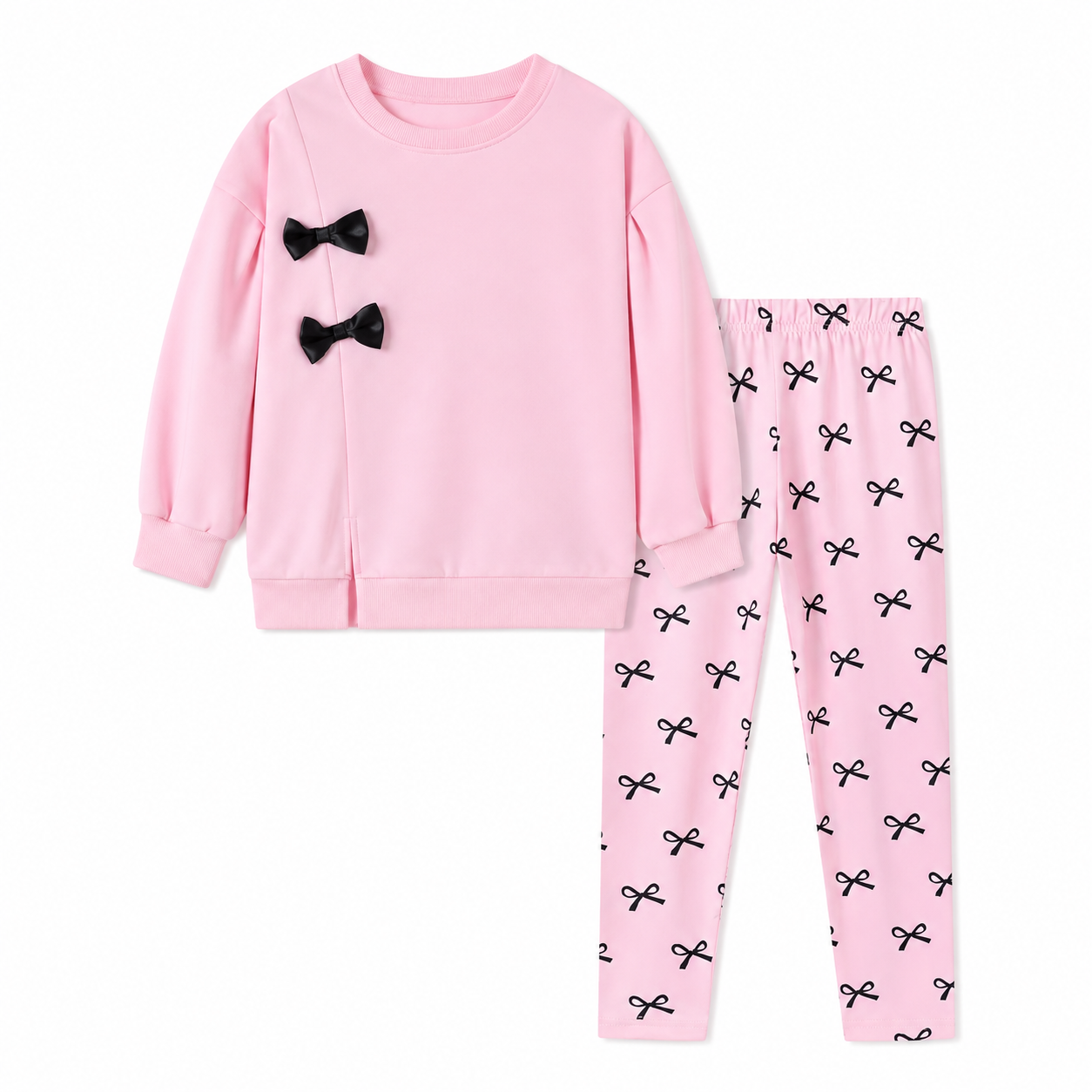 Front flat lay of a pink girls lounge set with black bow details and matching printed pants.