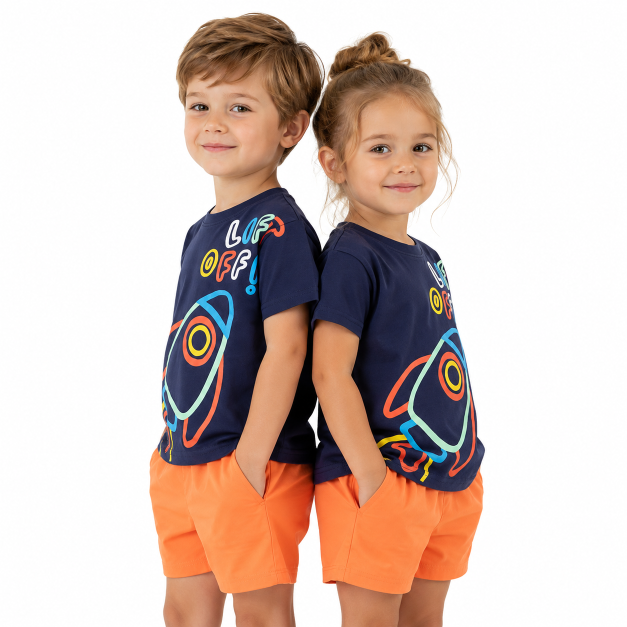 Toddler boy wearing rocket graphic summer outfit