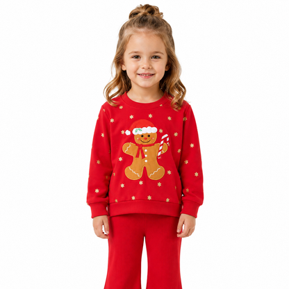 Girl model wearing a red holiday cotton matching set.