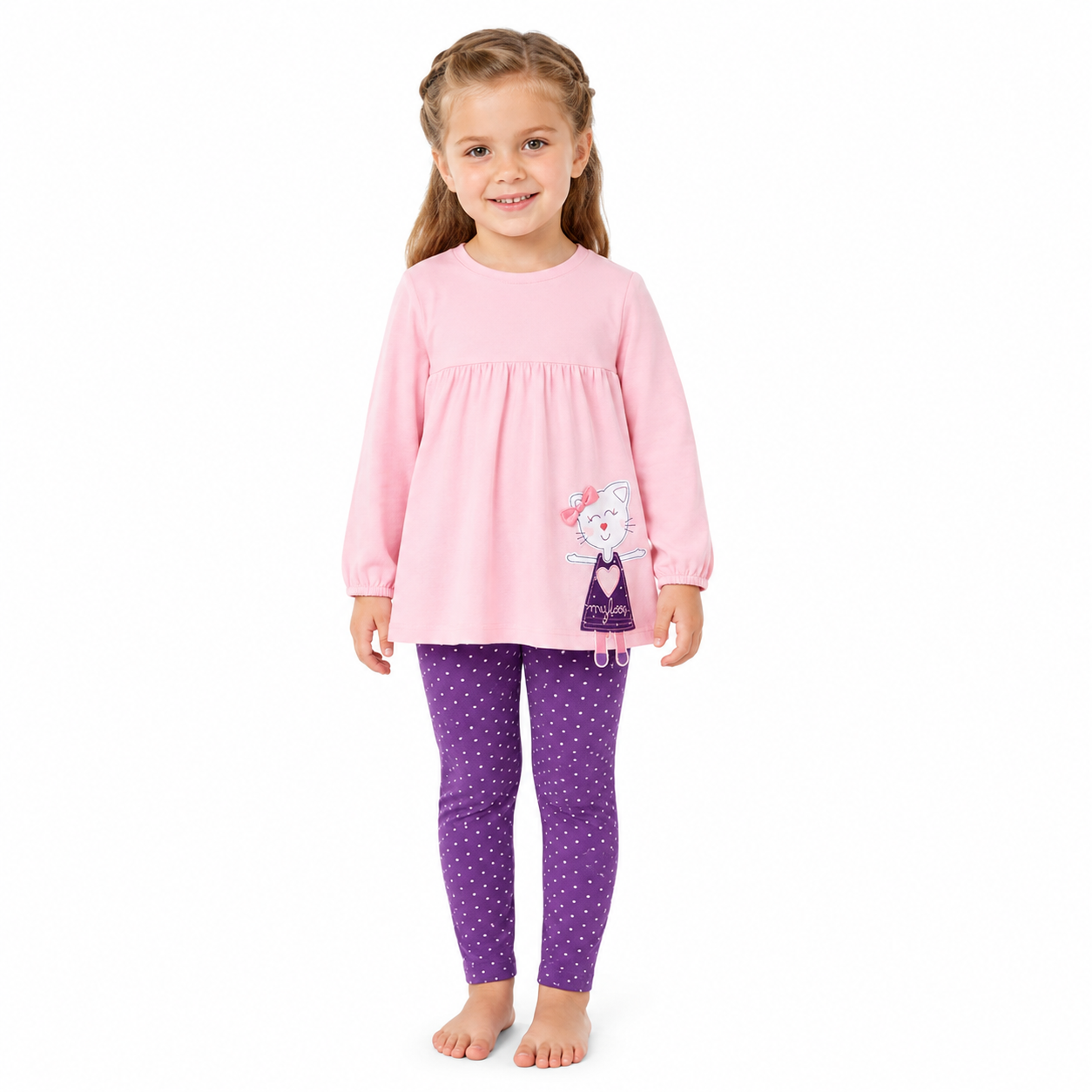 Girl model wearing the pink kitty top and purple polka-dot pants matching set.