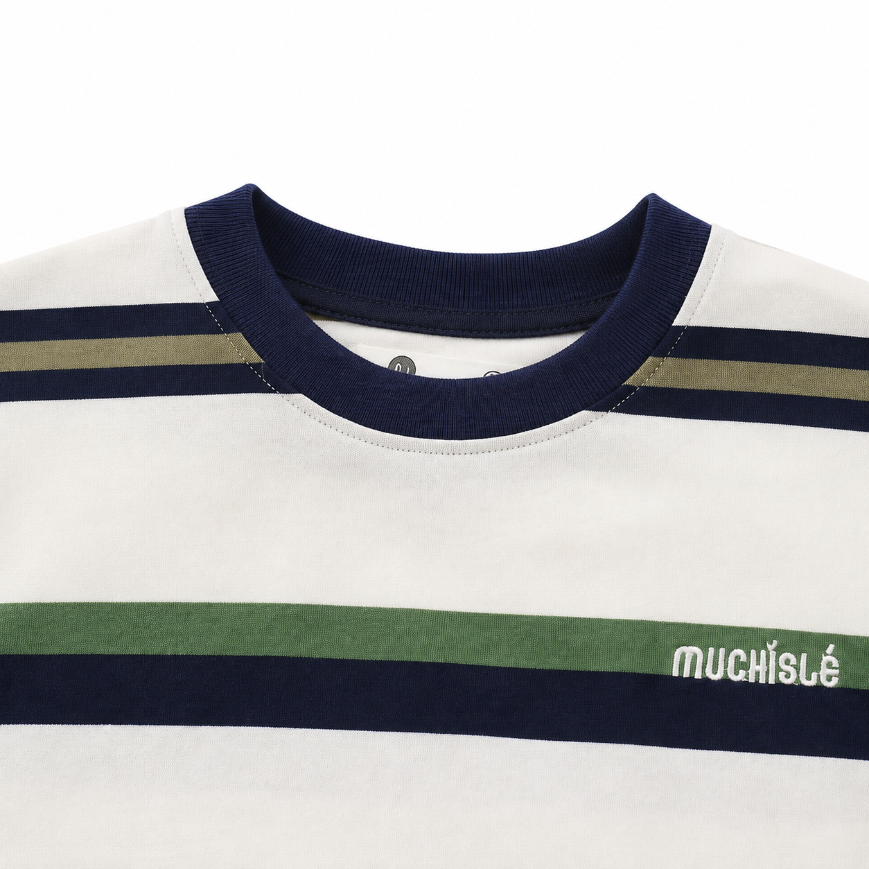 Close-up of the navy ribbed crew neckline and upper stripes on the white boys T-shirt.