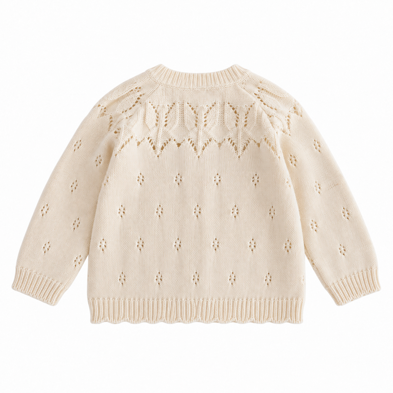 Back view of the cream girls cotton cardigan with openwork leaf-knit shoulders and small eyelet details.