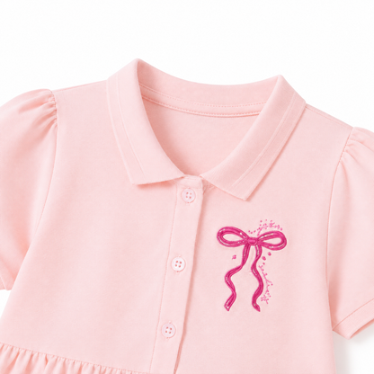 Pink collar detail of girls polo dress