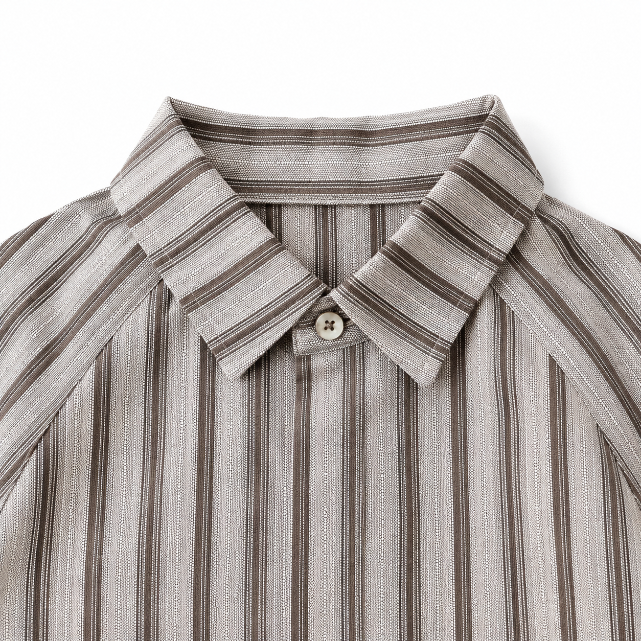 Collar and neckline detail of boys striped short sleeve shirt.