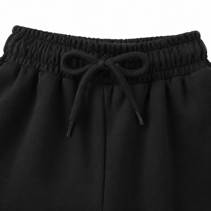 Black kids joggers elastic waistband and drawstring detail