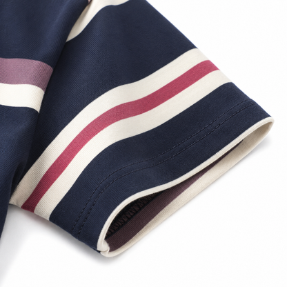 Close-up of the navy short sleeve hem with cream and pink stripe details.