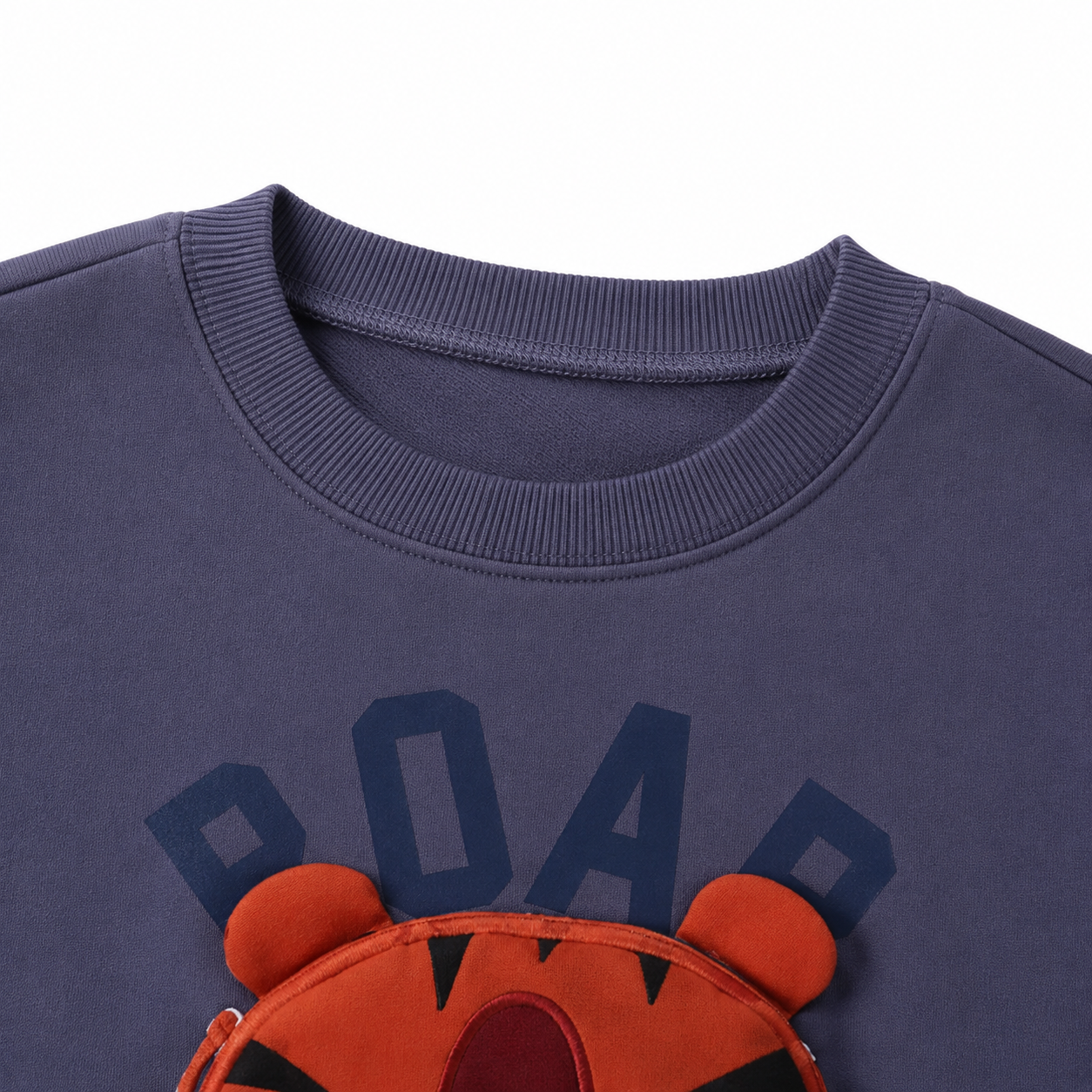 Close-up of the crew neckline detail on the kids sweatshirt.