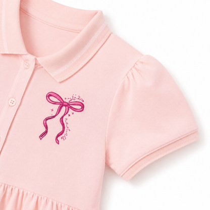 Pink short sleeve detail of girls polo dress