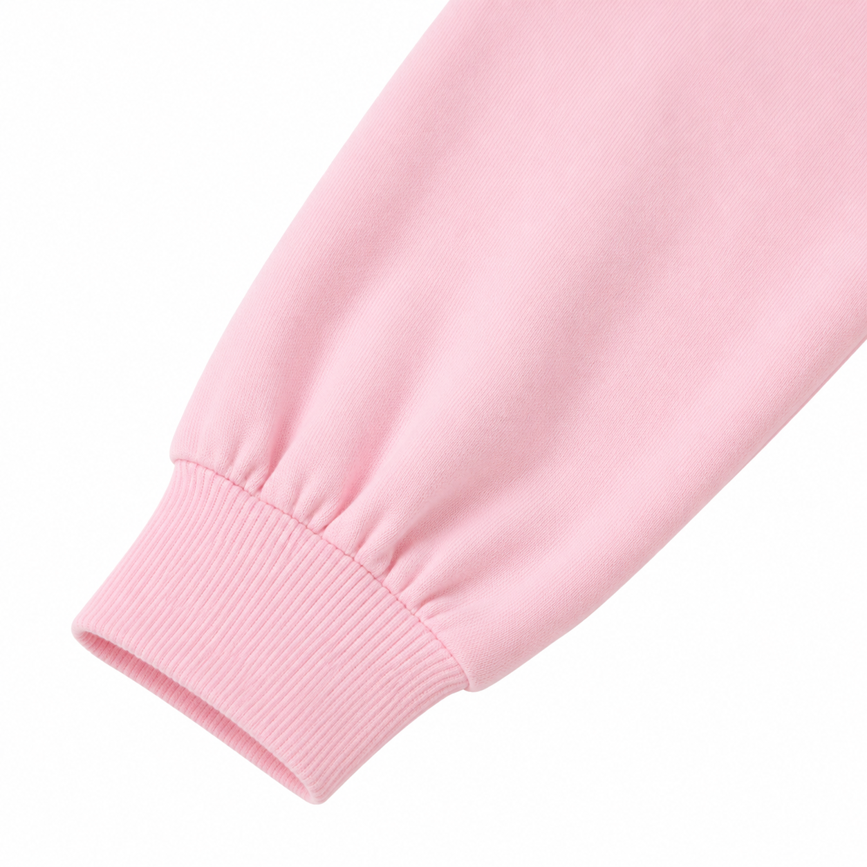 Close-up of sleeve detail on the pink girls dress.