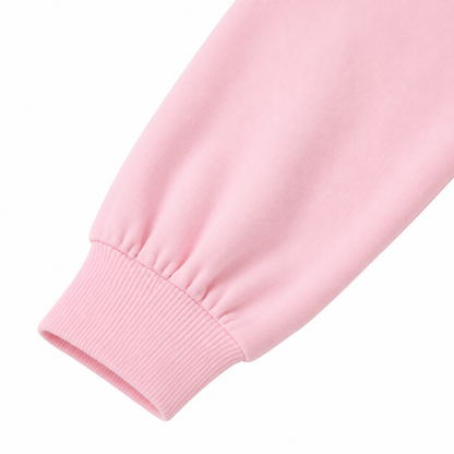 Close-up of sleeve detail on the pink girls dress.