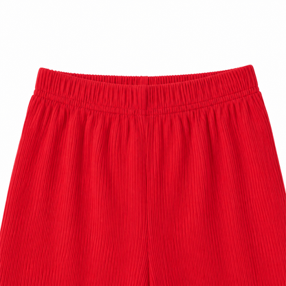 Close-up of matching flare pants detail.