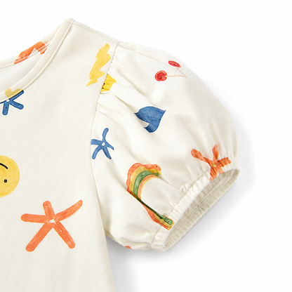 Close-up of sleeve detail on a girls cotton dress.