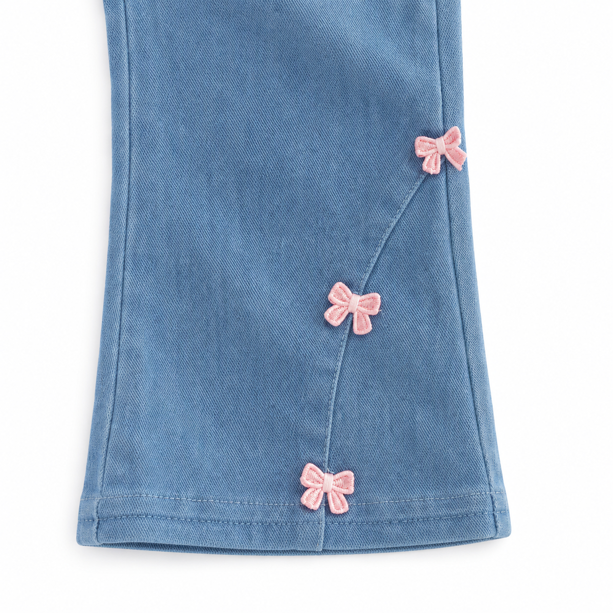 Pink bow detail on light blue girls jeans