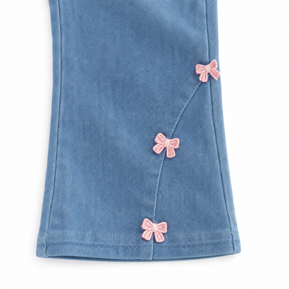 Pink bow detail on light blue girls jeans