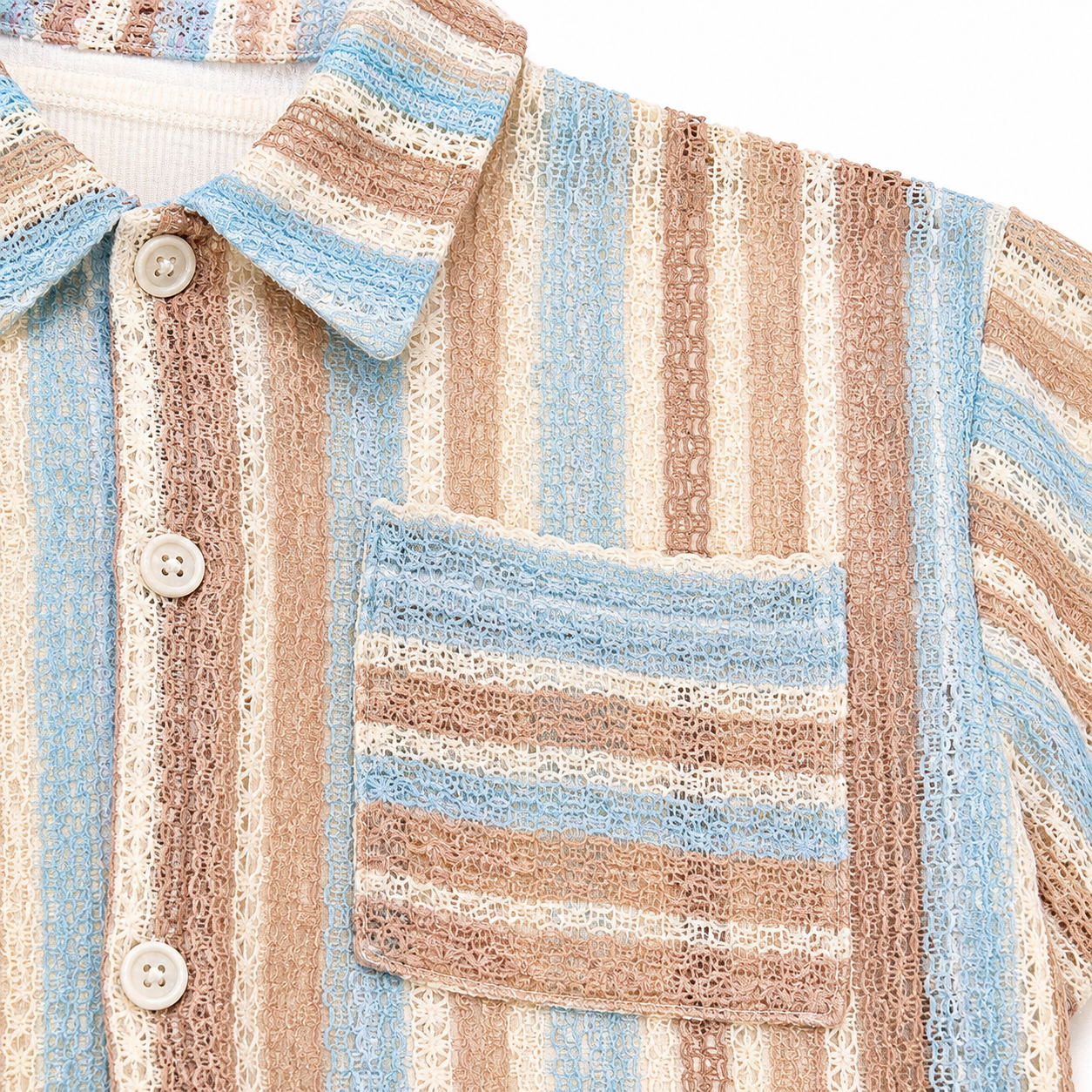 Pocket and stripe detail of boys textured short sleeve shirt.