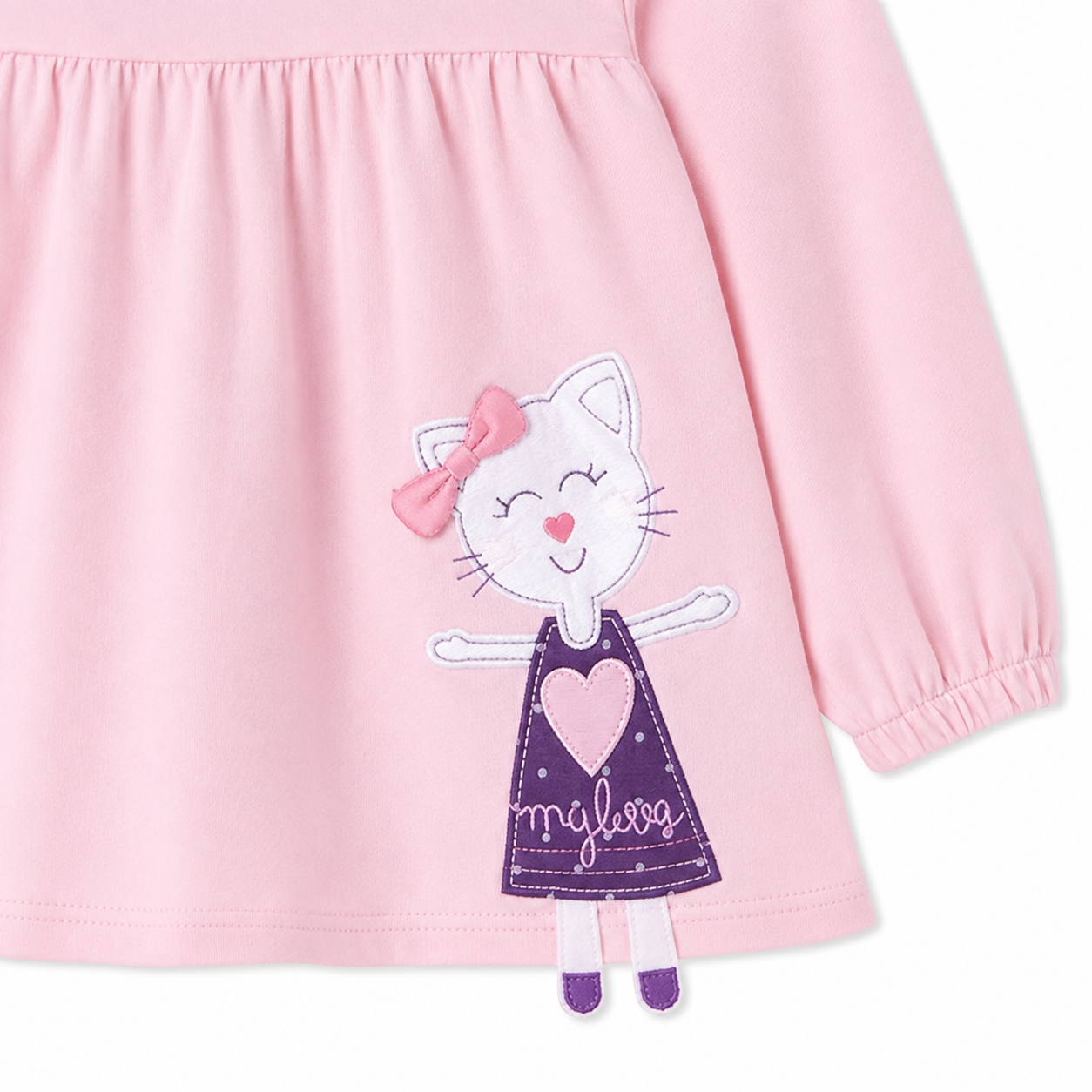 Close-up of the kitty character detail on the pink long-sleeve girls top.
