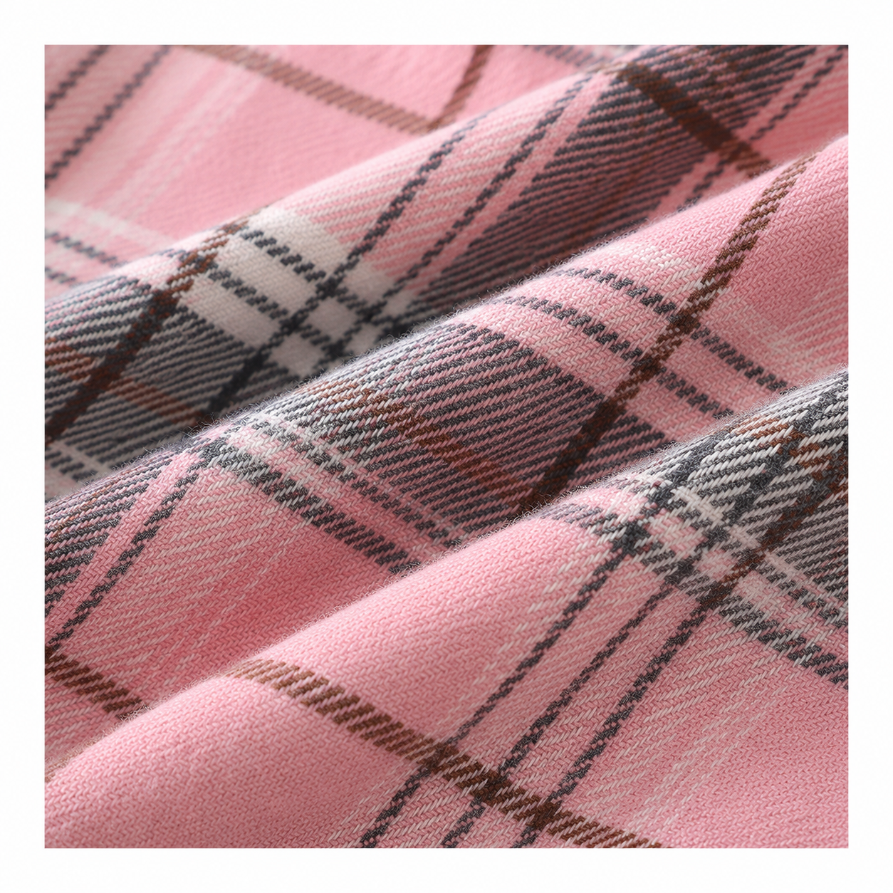 Pink kids plaid shirt fabric detail view