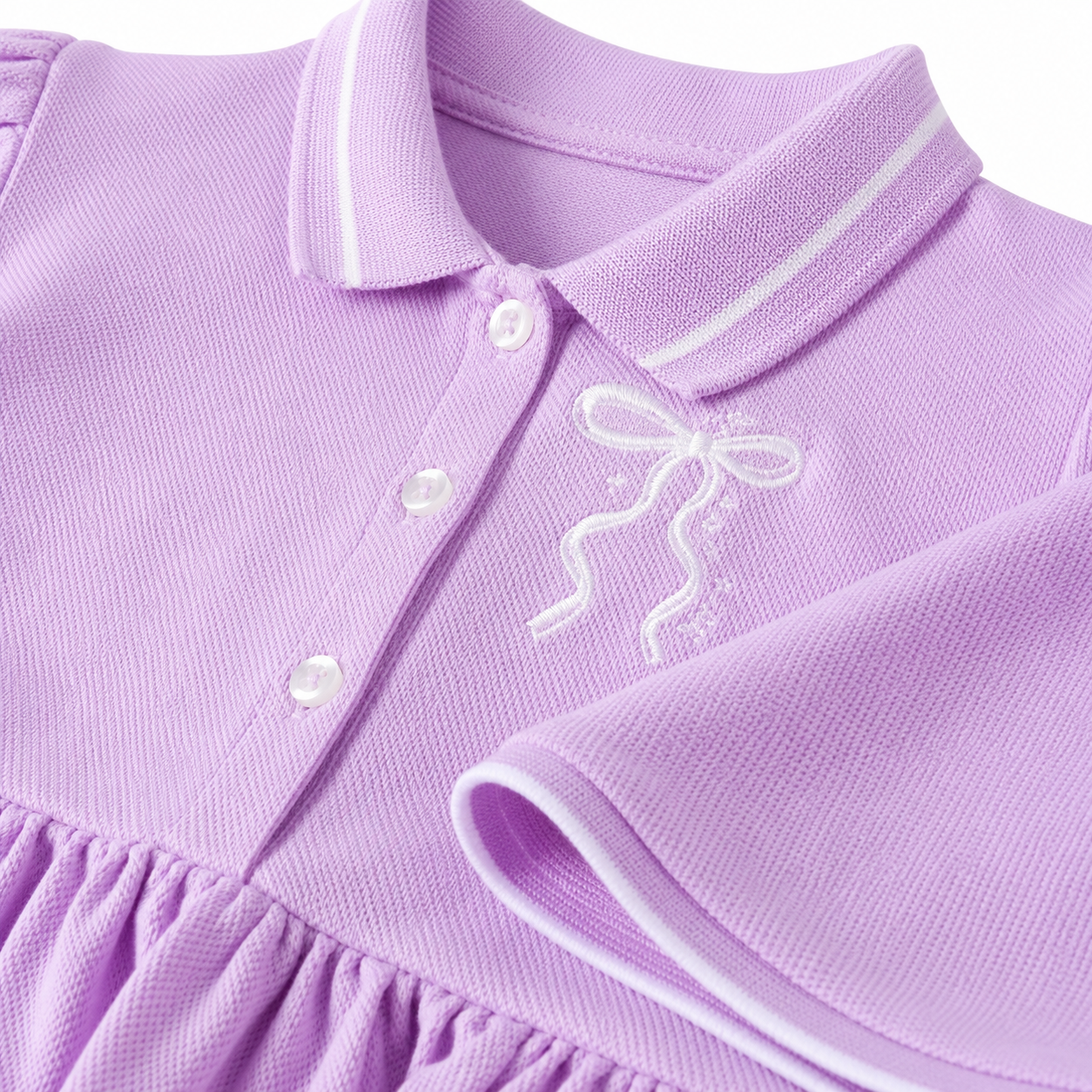 Lavender cotton fabric detail of girls polo dress