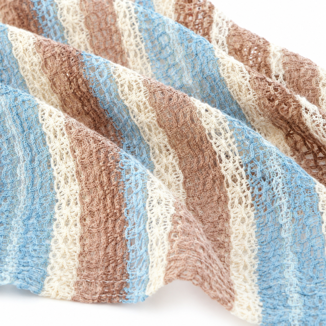Fabric texture detail of boys pastel stripe shirt.