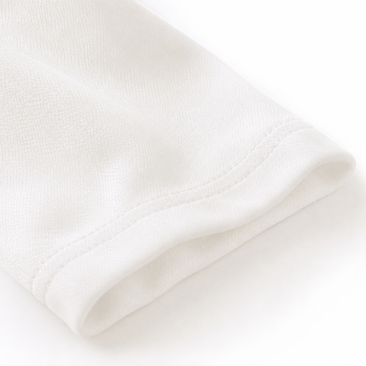 Close-up of the cotton fabric texture on a white girls top.