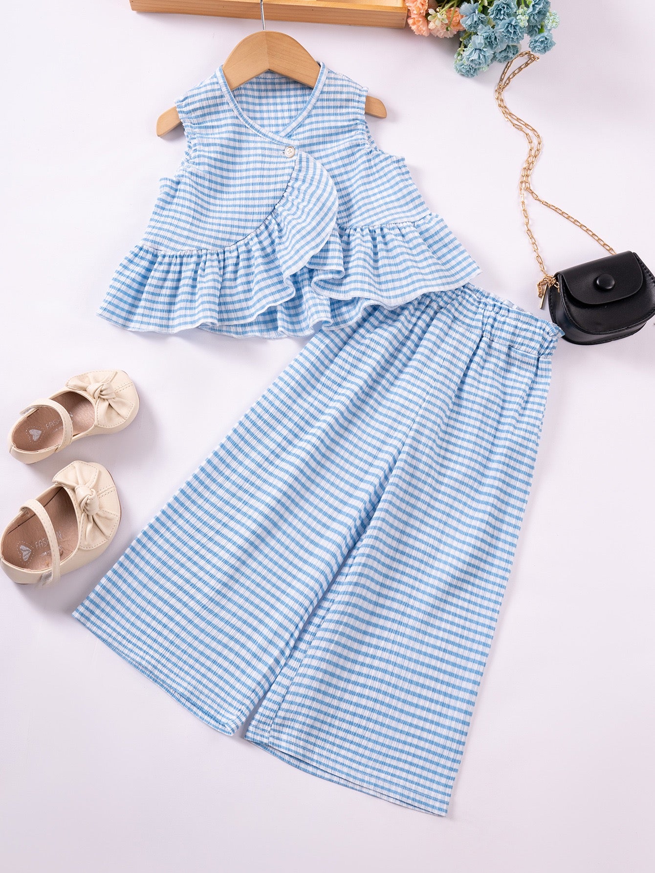 Girl wearing the Willow Gingham Set with wide-leg pants