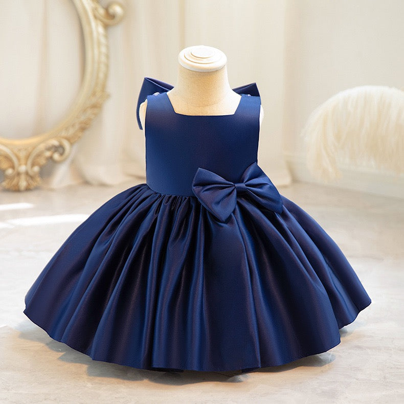Girls birthday dress featuring Estelle Bow Dress for dressy family gatherings