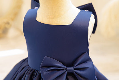Special occasion dress featuring Estelle Bow Dress for weddings and events