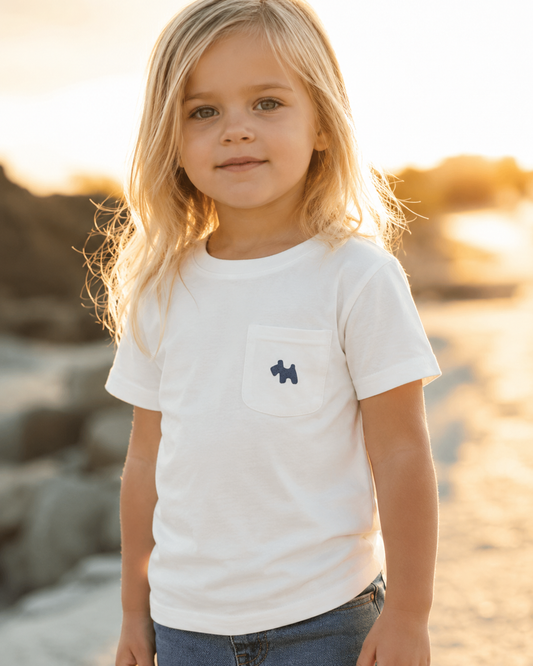 Kid wearing the Milo Pocket Tee outdoors