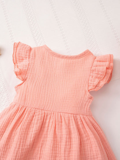 Special occasion dress with Meadow Button Dress for seasonal celebrations