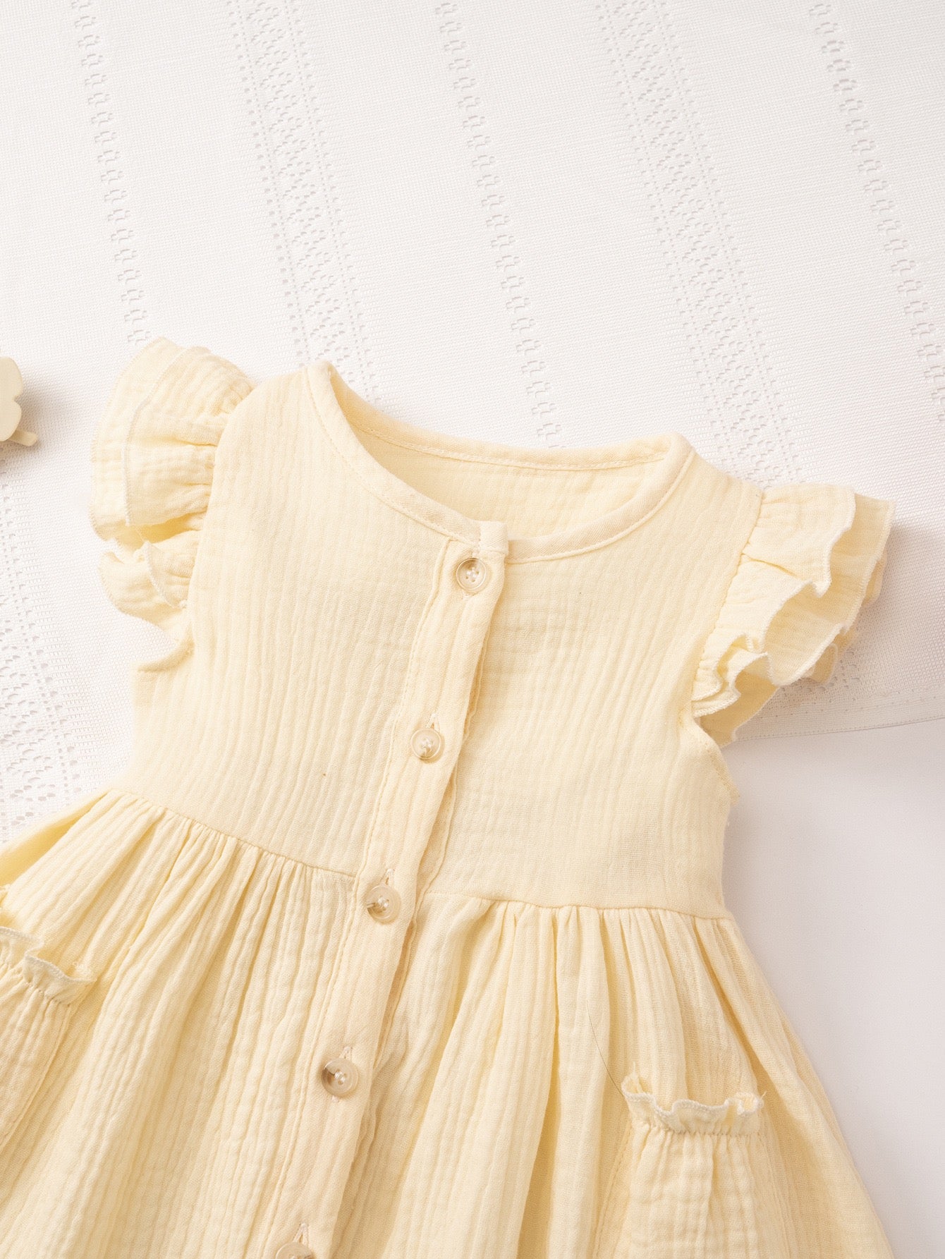 Girls cotton dress featuring Meadow Button Dress for seasonal celebrations