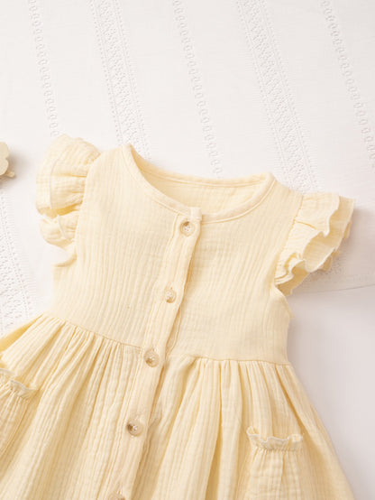 Girls cotton dress featuring Meadow Button Dress for seasonal celebrations