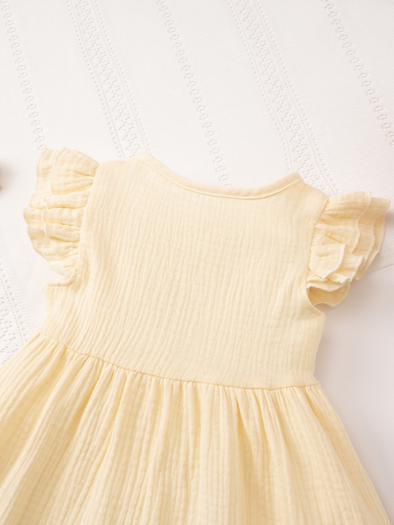 Girls party dress featuring Meadow Button Dress for family photos