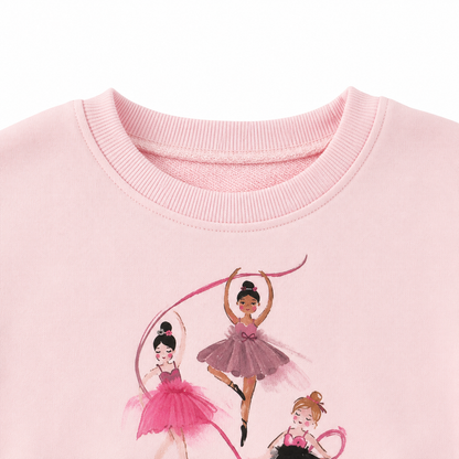 Close-up of the pink crew neckline and ballerina graphic on the girls top.
