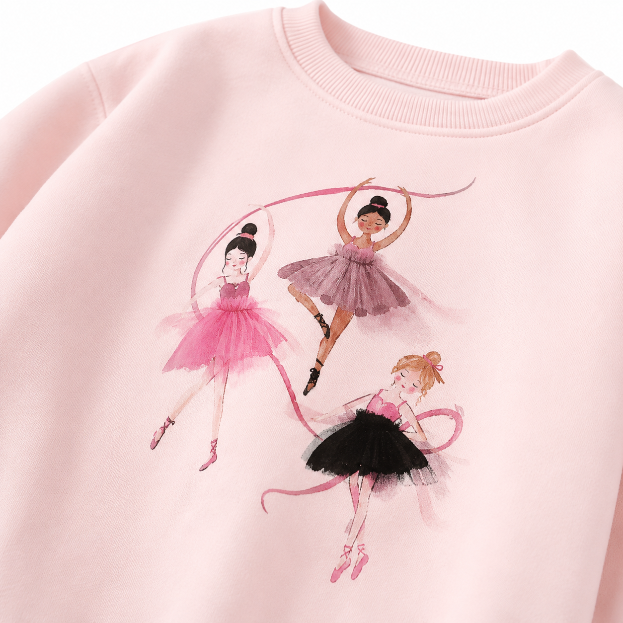 Close-up of the three ballerina friends graphic on the pink long sleeve top.