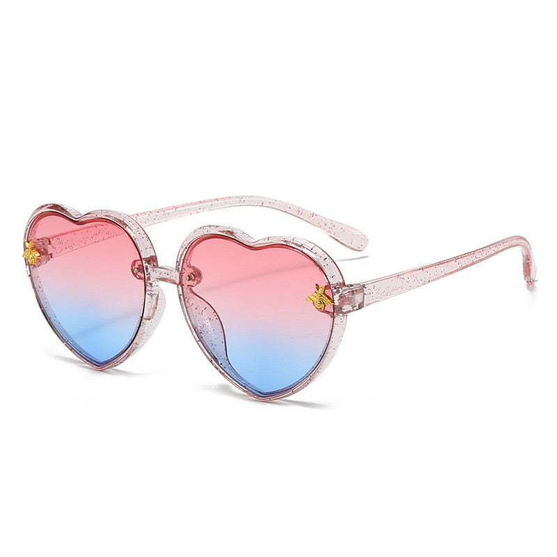 Pink and blue gradient heart sunglasses for kids with UV400 lenses and cute transparent frame.