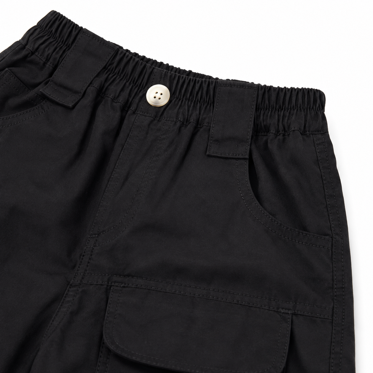Black cotton cargo shorts front pocket and elastic waistband detail