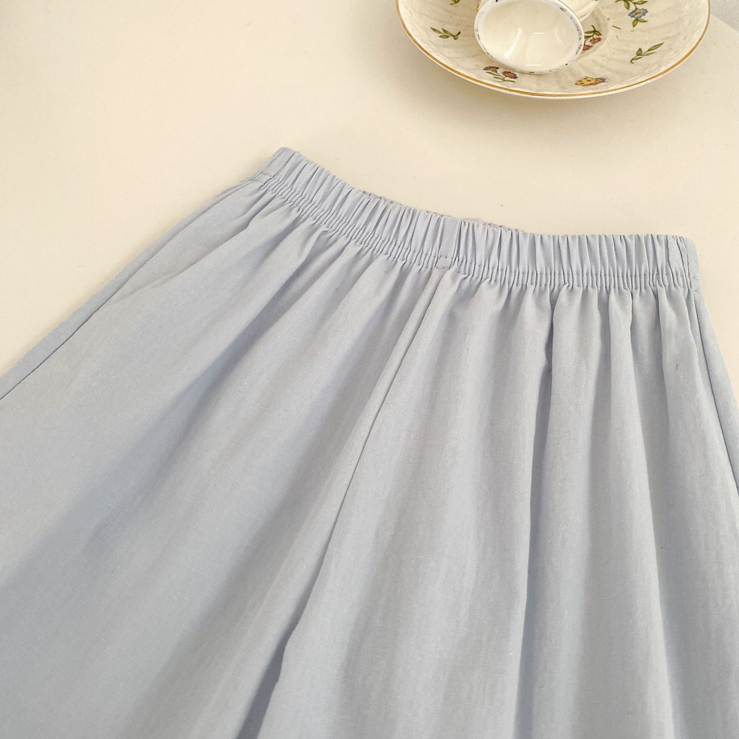 Close-up of the Bluebell Lace Set light blue pants with an elastic waistband.