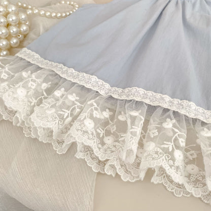 Close-up of the Bluebell Lace Set lace trim detail on the light blue sleeveless top.