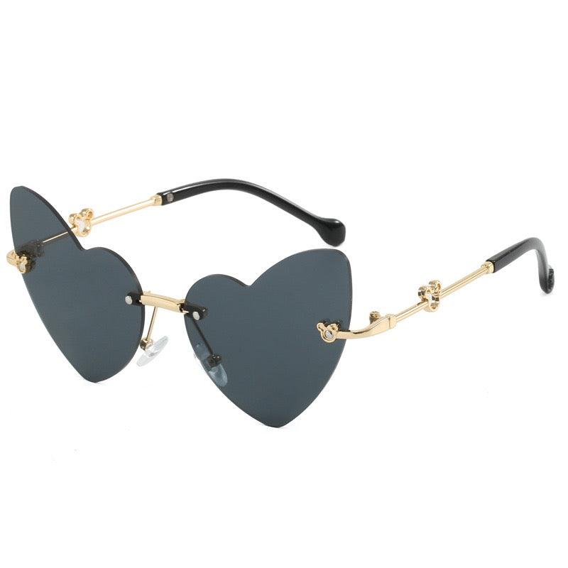 Black kids heart sunglasses with UV400 lenses and gold metal arms