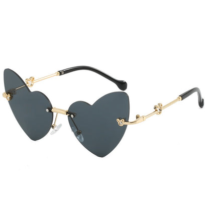 Black kids heart sunglasses with UV400 lenses and gold metal arms