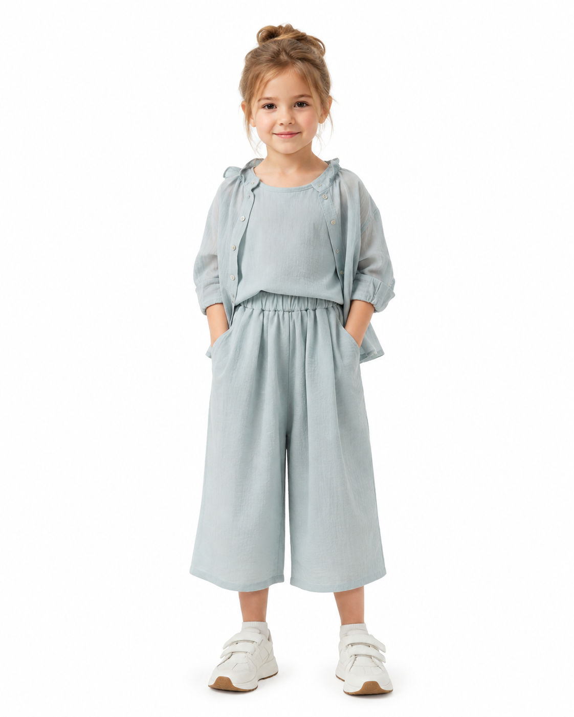 Girl model wearing the dusty blue wide-leg culotte pants.