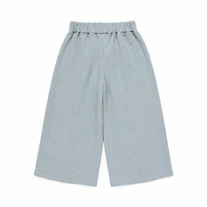 Back flat lay of the dusty blue girls wide-leg pants.