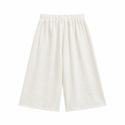 Back flat lay of the ivory girls wide-leg pants.