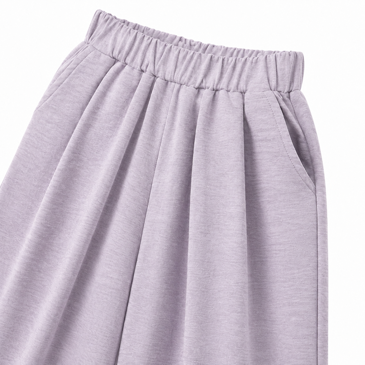 Close-up of the side pocket and wide-leg shape on the lavender pants.