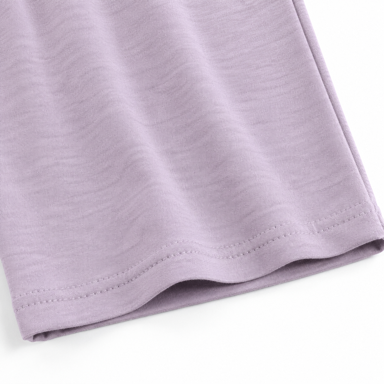 Close-up of the fabric texture and hem on the lavender culotte pants.