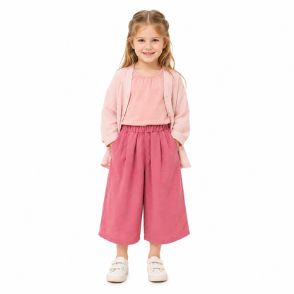Girl model wearing the rose pink wide-leg culotte pants.